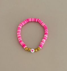 Bright pinkalicious love bracelet Trendy Pink Beaded Charm Bracelet, Adjustable Casual Bracelets For Valentine's Day, Playful Pink Adjustable Stretch Bracelet, Playful Pink Bracelets With Round Beads, Pink Round Beads Charm Bracelet For Friendship, Playful Adjustable Pink Stretch Bracelet, Pink Charm Bracelet With Round Beads For Friendship, Trendy Pink Charm Bracelet For Friendship, Adjustable Pink Stretch Bracelet