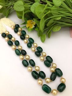 Exclusive quality green emerald facitate beads necklace. AAA super fine quality of emerald green faceted beads necklace. Most eligible gift for someone you love and someone very special for you. Best gift for your anniversary. Best gift for her birthday. Necklace : 1  Earrings : 1 pair Traditional Jade Jewelry For Weddings, Gemstone Beaded Necklaces With Round Beads For Celebration, Green Gemstone Beads Necklace For Wedding, Elegant Faceted Beads For Diwali, Green Beaded Bridal Necklace With Round Beads, Formal Kundan Necklace With Round Beads, Gold Beaded Emerald Necklace, Green Temple Jewelry Necklace With Faceted Beads, Green Kundan Necklace With Round Gemstone Beads