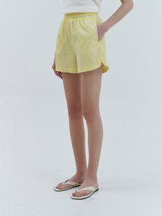 Editor's NotesThese are short pants made of breathable fabric with a waist banding detail providing a comfortable fit. You can wear these pants with a sleeveless top and a simple white shirt to complete a stylish vacay outfit.- Polyester material half pants- High-waisted design, short length- Side pockets for convenience- Come in a beautiful lemon colorMeasurements(in.)S / M- Length: 15.75 in. / 16.14 in.- Waist: 13.58 in. / 14.57 in.- Hips: 19.49 in. / 20.47 in.- Thigh: 12.80 in. / 12.99 in.- Hem: 12.40 in. / 12.60 in.- Rise: 12.80 in. / 12.99 in.*Measurements may not fully match within 0.8.*Model info: Height 5’10” Bust 12 in. Waist 9 in. Hips 14 in. Fitting Size SComposition & Care- 100% Polyester- Dry cleaning recommended- Do not tumble dry*When removing contamination, pl Versatile Summer Shorts For Loungewear, Versatile Relaxed Fit Shorts For Day Out, Versatile Relaxed Fit Summer Shorts, Versatile Summer Shorts For Day Out, Chic Summer Bottoms With Relaxed Fit, Chic Relaxed Fit Summer Bottoms, Versatile Spring Loungewear Shorts, Summer Bermuda Bottoms For Loungewear, Relaxed Solid Shorts For Summer