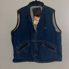 Nwt Vintage Dead Stock Wrangler Denim Vest Size Xl Perfect Condition Sherpa Lined Offers Accepted Bundle To Save Questions Just Ask Outdoor Medium Wash Denim Outerwear, Casual Cotton Outerwear For Rodeo, Western Style Dark Wash Outerwear With Pockets, Rugged Denim Jacket With Pockets For Outdoor, Outdoor Denim Vest With Pockets For Fall, Brown Denim Jacket For Streetwear, Casual Denim Vest With Pockets For Outdoor, Casual Brown Outerwear For Rodeo, Western Denim Outerwear With Pockets