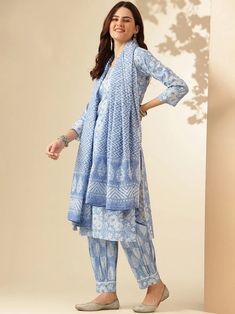 Grab this beautiful 3-piece set. The set comes with printed & embroidered kurta has v neck; 3/4th sleeves & calf length teamed with printed bottom and a chanderi cotton dupatta. Color - Light Blue Kurta Fabric-Viscose Pant Fabric-Viscose Dupatta Fabric - Chanderi Cotton Neck-V Neck Sleeves-3/4th Sleeves Work - Print & Embroidery Detailing Washing Instructions-Dry Clean Model Height - 5.5 wearing size small. DISCLAIMER - The color of the product may be differ due to screen settings of device. A misprint here and a color drop slip there is the beauty of printing which is not treated as a defect. Cotton V-neck Set With Dupatta, V-neck Sets With Printed Motifs For Eid, Blue Chikankari Embroidery Sets For Spring, Blue Traditional Drape Set For Spring, Blue V-neck Bollywood Style Sets, Spring Blue Traditional Drape Set, Spring Sets With Chikankari Embroidery In Traditional Drape, Blue V-neck Sets With Resham Embroidery, Blue Block Print Traditional Drape Set