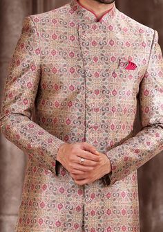 Ready-Made Sherwani With Trouser. All Over Jacquard Brocade Style Printed Fabric Top. Art Dupion Aligarhi Ready Made Trouser. Crafted in Chinese Collar Neck, and Full Sleeve. Satin Lining with Plain Work. High-Quality Matching Buttons. Please Note: The footwear shown in the picture is for presentation and photography purpose only. Color: There might be slight color variation due to lightings and flashes while photo shooting. The color may also vary because of different screen resolutions. Wash C Festive Pink Long Sleeve Bandhgala, Traditional Long Sleeve Pink Bandhgala, Traditional Pink Long Sleeve Bandhgala, Festive Multicolor Straight Kurta Bandhgala, Semi-stitched Jamawar Sets With Motifs, Festive Bandhgala With Resham Embroidery In Banarasi Silk, Festive Banarasi Silk Bandhgala With Resham Embroidery, Traditional Fitted Suit For Ceremonial Occasions, Traditional Suits With Resham Embroidery For Diwali