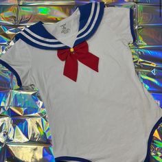 Women's White And Blue Bodysuit Sz M/L New! Sailor Style , Cute! Blue Cotton Beach Bodysuit, Blue Cotton Bodysuit For The Beach, Blue Sleeveless Cotton Bodysuit, White Short Sleeve Bodysuit For The Beach, White Short Sleeve Bodysuit For Beach, Casual Blue Onesie For Summer, Blue Fitted Short Sleeve Onesie, Casual Blue Summer Onesie, Casual Blue Cotton Bodysuit