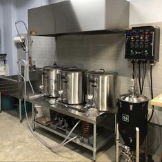 the kitchen is clean and ready to be used as a cooking station for some type of food