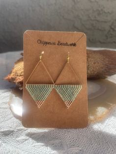 These stunning gold and avocado colored earrings are perfect for everyday wear!     Made with: * brass triangles   * 11/0 Miyuki beads  * 11/0 Miyuki gold-plated beads  * gold plated earring hooks     Thank you for supporting my small business. All designs are hand made in Phoenix, Arizona. Please do not replicate. Minimalist Gold Beaded Earrings, Gold Teardrop Beaded Earrings, Geometric Beaded Gold Jewelry, Gold Beaded Nickel-free Earrings For Summer, Geometric Gold Beaded Jewelry, Gold Geometric Beaded Jewelry, Gold Geometric Beaded Earrings As A Gift, Geometric Beaded Earrings, Gold Beaded Geometric Jewelry