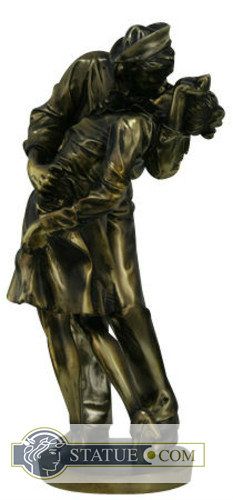 a bronze statue of two men hugging each other