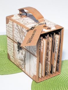 a wooden box that has some books in it