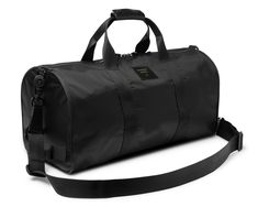 MADE IN USA: Handmade in our Los Angeles HQ, this customizable duffle is a lightweight and outdoor-ready version of our sleek original Duffle. This duffle bag is perfectly sized for a quick getaway, holiday travel, an adventure to the great outdoors, or a trip to the gym.- Premium full-grain leather- Swiss-made Riri zippers in antique finish- Bullhide leather handles and accents- Durable IFAC class 1 fire retardant interior with waterproof black nylon lining and a zippered pocket- Removable and Quick Getaway, Fire Retardant, Black Nylon, Antique Finish, Leather Handles, Black Nylons, Holiday Travel, Full Grain Leather, Leather Handle