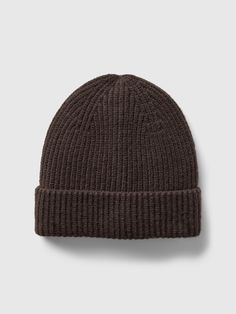 a brown beanie hat on a white background