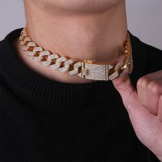 Who says chains have to be boring? Not us, that's for sure. With our 20mm chains plated statement collar, you can make a powerful fashion statement without saying a word.This piece is crafted with high quality 18k gold plated metal and adorned with glittering cubic zirconia stones. It's available in a variety of lengths, so you can find the perfect fit for your neckline. Whether you're looking to add a little sparkle to your everyday look or turn heads at your next big event, this necklace is su Gold Cuban Link Necklace For Streetwear, Gold Cuban Link Necklace With Curb Chain For Streetwear, Gold Chunky Chain Jewelry For Streetwear, Luxury Gold Jewelry For Streetwear, Gold Cuban Link Jewelry For Streetwear, Gold Chain Link Jewelry For Streetwear, Cuban Link Chain Jewelry For Streetwear, Gold Link Jewelry For Streetwear, Gold Chain Link Necklace For Streetwear