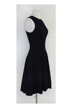 Size X-Small Black Sleeveless Flared Dress Body 86% Rayon 13% Nylon 1% Spandex Slips on Full skirt Shoulder to Hem 35" Sleeveless Ribbed Dress For Night Out, Ribbed Sleeveless Dress For Night Out, Party Sleeveless Ribbed Stretch Dress, Evening Sleeveless Ribbed Midi Dress, Sleeveless Ribbed Midi Dress For Evening, Ribbed Stretch Sleeveless Party Dress, Stretch Ribbed Sleeveless Party Dress, Stretch Ribbed Sleeveless Dress For Party, Black Ribbed Elastane Dress