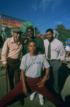 a group of men standing next to each other