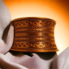 Bohemian Copper Bangle As A Gift, Bohemian Copper Bangle For Gifts, Antique Brass Bangle For Gifts, Antique Brass Bangle Gift, Engraved Metal Bangle For Festivals, Traditional Handmade Brown Bangle, Bohemian Gold Etched Cuff Bracelet, Gold Bohemian Etched Cuff Bracelet, Handmade Ornate Brass Bracelets