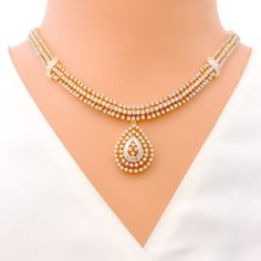 This exquisite 18k gold set, weighing 48.3 grams, features an opulent leaf-adorned design adorned with dazzling diamonds. The yellow gold finish enhances its luxurious appeal, making it perfect for any special occasion. The set includes a necklace with a total diamond weight of 7.47 carats, featuring F-G color and VS quality diamonds in round and tapered baguette shapes. The necklace has a length of 16.5 inches with a 1-inch drop length, adjustable 1-inch links, and a secure hook lock. The match Elegant Yellow Gold Bridal Necklace With 17 Jewels, Formal Gold Diamond Necklace Hallmarked, Luxury Jewelry Sets With Diamond Accents For Celebration, Formal Yellow Gold Hand Set Necklace, Formal Yellow Gold Hand-set Necklace, Formal Hand Set Yellow Gold Necklace, Luxury Hallmarked Diamond Necklace For Celebrations, Luxury Gold Hand Set Diamond Necklace, Classic Gold Hand Set Necklace