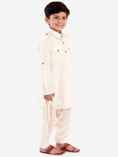 VASTRAMAY Boys Cream Cotton Blend Pathani Suit Set The VASTRAMAY Boys Cream Cotton Blend Pathani Suit Set is an elegant and traditional outfit perfect for special occasions. Designed for comfort and style, this suit set ensures your little one looks charming and feels comfortable. Features Elegant cream color Traditional Pathani design Comfortable fit Suitable for special occasions Specifications Brand: VASTRAMAY Color: Cream Material: Cotton blend Size: Available in various sizes Material & Car Transitional Off-white Cotton Set, Classic Long Sleeve Festive Traditional Wear, Off White Dabka Sets For Diwali, Classic Eid Festive Sets, Classic Festive Sets For Eid, Cream Dabka Sets For Transitional Season, Traditional White Pant Set For Wedding, Classic Long Sleeve Sets For Eid, Traditional Long Sleeve Cotton Pant Set