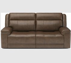 a brown leather couch sitting on top of a white floor