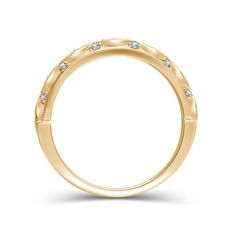 Make the day special with this art deco-inspired diamond anniversary band. Crafted in warm 14K gold, this slender style features sparkling duos of round diamonds in milgrain-edged marquise-shaped frames. Smaller accent diamonds complete the design. Radiant with 1/8 ct. t.w. of diamonds and a brilliant buffed luster, this anniversary band is a romantic look she'll love. Classic Diamond Eternity Band With Decorative Design, Elegant Milgrain Diamond Ring For Formal Occasions, Elegant Formal Diamond Ring With Milgrain Detail, Elegant Formal Diamond Ring With Milgrain, Timeless Diamond Rings With Milgrain Detail, Yellow Gold Diamond Jewelry With Milgrain Detail, Heirloom Diamond Ring With Decorative Band, Round Cut, Heirloom Round Cut Diamond Ring With Decorative Band, Diamond Eternity Band With Decorative Details For Anniversary