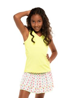 The classic tennis tank gets Lucky’s fun, modern touch. A neon yellow, V-neck tank with a racerback, mesh detailing down the sides and fun neck line cutout details. Casual Sleeveless Tops For Tennis, Sleeveless Summer Tennis Tops, Sleeveless Tops For Summer Tennis, Sleeveless Tennis Tops For Summer, Casual Sleeveless Tank Top For Tennis, Yellow Sleeveless Sports Tank Top, Yellow Sleeveless Tank Top For Sports, Yellow Sleeveless Athleisure Top, Sporty V-neck Tank Top For Spring