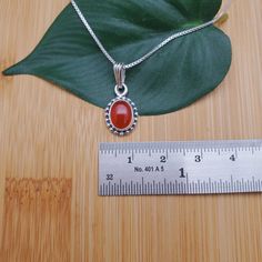 "Visit our on-line shop at: Etsy.com/shop/AlbuquerqueDesigns *sterling silver necklace pendant *Small pendant with silver box chain necklace 18\" *southwestern jewelry *carnelian / healing carnelian *calibrated pre-cut stones: 9x7mm oval shape *back of jewelry items are all covered / do not show the back of stones *all jewelry items are made to ship, slight variations in stones will occur comparing to pictures. *size of a penny is 19mm or a dime is 18mm in diameter for comparing size with jewelr Orange Oval Necklace For Gift, Classic Orange Necklace For Gifts, Classic Orange Necklace For Gift, Carnelian Cabochon Jewelry As A Gift, Carnelian Cabochon Jewelry Gift, Orange Oval Sterling Silver Necklace, Oval Orange Sterling Silver Necklace, Silver Carnelian Cabochon Necklace, Stamped 925 Carnelian Jewelry