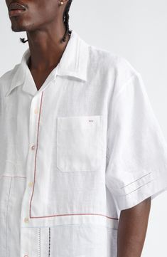 Put a fresh spin on your laid-back warm-weather look with this linen bowling shirt detailed with a bricolage of embroidery in assorted styles and hues. 28" length, 45" chest (size 48EU) Front button closure Convertible collar Short sleeves Chest patch pocket 100% linen Dry clean Made in Italy White Embroidered Camp Shirt For Spring, Spring Embroidered White Camp Shirt, White Embroidered Camp Shirt For Summer, White Embroidered Summer Camp Shirt, White Embroidered Cotton Camp Shirt, White Cotton Embroidered Camp Shirt, Embroidered Collared White Camp Shirt, White Embroidered Collared Camp Shirt, White Linen Camp Shirt For Spring