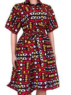 Add a touch of culture and style to your wardrobe with our Tribal African Print Midi Dress. With its vibrant and unique print, this dress is a sure way to stand out in any occasion. Made with high-quality materials, it offers both comfort and fashion in one. Casual A-line Dress With Geometric Pattern, Casual A-line Dress With Abstract Print, Cotton V-neck Dress With Graphic Print, Casual Patterned Dress With Graphic Print, Casual Graphic Print Patterned Dress, Patterned Printed A-line Dress, Multicolor Geometric Pattern Casual Dress, Red Abstract Print Dress For Vacation, Multicolor A-line Dress With Graphic Print