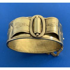 * Vintage 925 Sterling Silver Vermeil Floral Scroll Buckle Hinged Cuff Bracelet * Inner Cuff Measures: 7.0" * Width: 15/16" * Safety Chain Is Attached * Weight: 31.9 G * Marked: Makers Mark * Professionally Assayed * Condition: As Pictured. (Zit225br) * S5061 Ornate Engraved Bangle For Formal Occasions, Antique Etched Cuff Bracelet For Formal Occasions, Antique Engraved Cuff Bracelet For Formal Occasions, Formal Engraved Cuff Bracelet, Antique Sterling Silver Bangle For Formal Occasions, Victorian Etched Cuff Bracelet For Formal Occasions, Ornate Etched Cuff Bracelet For Formal Occasions, Engraved Cuff Bangle For Wedding, Wedding Engraved Cuff Bangle