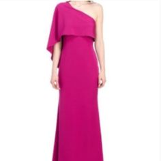 Here Just In Time For Wedding Season, This Stunning Gown From Vince Camuto Is Tailored With An Asymmetrical Neckline With A Single Draped Caplet Sleeve For A Silhouette That Feels Plucked From The Runways. Features Asymmetrical Neckline Single Cape Sleeve Layered Side Zip Length: 60" Shell: Polyester/Spandex; Lining: Polyester Color: Fuchsia Formal Pre-draped Pink Gown, Pre-draped Fitted Evening Dress For Wedding Guest, Elegant Asymmetrical Pink Evening Dress, Elegant Pink Asymmetrical Evening Dress, Pre-draped One-shoulder Evening Dress For Wedding, Elegant Fitted Gown With Asymmetrical Shape, Pink Fitted Gown With Asymmetrical Neckline, Elegant Fitted Asymmetrical Gown, Spring Wedding Gown Pre-draped Style