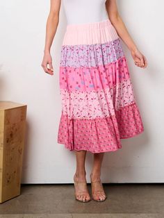 Fun patchwork tiered skirt in pink with elastic waistband. 100% Polyester Dry clean only. One size fits all. Fits like a Small or Medium. Very stretchy waistband. Length-30 |Waist-26 modest dresses, modest dress, modest midi, modest maxi, modest fashion, modest trendy dresses, modest boutique, modest attire, modest clothing, modest tops, modest skirts, modest shop Pink Gathered Skirt Dress For Spring, Pink Spring Dress With Gathered Skirt, Spring Pink Dress With Gathered Skirt, Pink Dress With Gathered Skirt For Spring, Pink Tiered Ruffle Maxi Skirt, Pink Tiered Flowy Maxi Skirt, Spring Tiered Dress With Relaxed Skirt, Casual Pink Ruffled Maxi Skirt, Feminine Pink Gathered Maxi Skirt