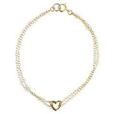 This little heart is so perfect to add to your bracelet stack. A simple 18k gold heart with a chain looped through making a double chain bracelet. It's too cute. -18k solid gold pendent -18k gold chain -heart measures 5.2x5mm -6.5" chain length Double Chain Bracelet, Gold Pendent, Gold Heart Bracelet, Chain Heart, 18k Gold Chain, Chain Loop, Double Chain, Gold Heart, Heart Bracelet