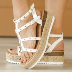 These Studded Wedge Sandals Are A New Fav For Spring. Features Gold Studs On Straps And Two Buckles On The Sides. Bottom Buckle Has Velcro Option For Easy Adjustment. Espadrilles Detail Platform Platform: Front- 1.5" Back- 2" New White Wedge Sandals For Summer, White Wedge Sandals For Summer Beach, White Platform Sandals For Vacation, White Ankle Strap Wedge Sandals For Summer, White Synthetic Wedge Sandals For Beach, White Wedge Sandals For Beach Vacation, White Round Toe Wedge Sandals For Beach Season, White Wedge Heel Sandals For Beach, White Wedge Sandals For Beach