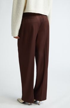 A single pleat cuts a crisp crease down the front of these mid-rise trousers tailored with a relaxed fit. 31" inseam; 20 1/2" leg opening; 13" front rise; 16 1/2" back rise (size 8) Zip fly with hook-and-bar closure Front slant pockets 65% rayon, 35% cotton Dry clean Made in the USA Designer Clothing Brown Pressed Crease Office Bottoms, Tailored Straight Hem Brown Bottoms, Brown Tailored Bottoms With Straight Hem, Classic Brown Bottoms With Straight Hem, Modern Relaxed Fit Bottoms For Formal Occasions, Classic Brown Straight Hem Pants, Classic Brown Pants With Straight Hem, Classic Brown Wide Leg Office Pants, Brown Tapered Leg Dress Pants With Pressed Crease