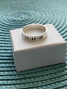 Sterling silver memorial ring personalized with a name, date of passing, inspirational phrase- perfect remembrance gift for men and women to honor a loved one. - Sterling silver, hand stamped band measures 6mm. - Personalize with up to 30 characters. -Hand stamped rings will stretch slightly when stamped, so more letters = more stretching. HOW TO ORDER: 1. Select Your Drop Downs. 2. Add to cart. 3. Leave me a note in the message to seller during checkout with your personalization up to 30 charac Meaningful Hand Stamped Stackable Rings For Anniversary, Hand Stamped Ring For Anniversary, Silver Hand Stamped Rings For Anniversary, Meaningful Silver Engraved Ring For Anniversary, Hand Stamped Silver Rings For Anniversary, Hand Stamped Stackable Rings For Anniversary, Classic Hand Stamped Rings For Anniversary, Classic Hand Stamped Anniversary Rings, Personalized Silver Engraved Ring For Mother's Day