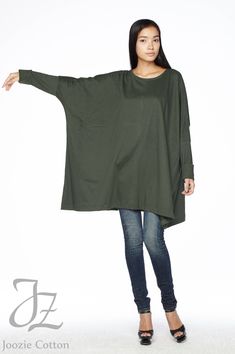 "🚚..ALL ORDERS ARE SHIPPED VIA DHL EXPRESS MAIL Simple and modern, with an air of urban playfulness, this top has boxy, wide cuffed hem sleeves and a scoop neckline; the extra wide body gives you all the comfort without losing an ounce of style! DETAILS: * Pull-on style * Scoop neck * Wide cuffed hem sleeves * Longer at the side hems * Loose silhouette MEASUREMENTS: Sleeve length: 25\" (63.5 cm) Sleeve cuff: 10\" (25.5 cm) round Bust: 78\" (354 cm) Hips: 84\" (213 cm) Tunic length from shoulder Fashion Over 50 Fifty Not Frumpy, Fitted Tunic Tops, Fitted Tunic, Scoop Neck Long Sleeve, Wide Body, Refashion Clothes, Sleeve Cuff, Tunic Length, Long Sleeve Tunic