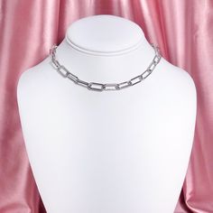 "This listing is for a stainless steel chunky chain necklace or choker, depending on desired length. Necklace comes with a 2.5\" extension so that it may be adjustable for layering. Max length for 14\" option is 16.5\", max length for 16\" option is 18.5\", and max length for 18\" option is 20.5\". Each component of the necklace, including the chain, is made from hypoallergenic stainless steel." Minimalist Stainless Steel Choker Chain Necklace, Trendy Adjustable Paperclip Chain Necklace, Silver Chunky Chain Charm Necklaces For Everyday, Adjustable Stainless Steel Chain Link Necklace, Trendy Silver Link Choker, Everyday Silver Charm Necklace With Chunky Chain, Silver Metal Charm Necklaces With Paperclip Chain, Silver Paperclip Chain Charm Necklaces, Silver Metal Charm Necklace With Paperclip Chain