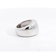 Vintage Cartier Nouvelle Vague Ring, set in 18K White Gold.   This unisex dome ring showcases a remarkable display of gleaming silver/white hues. An authentic vintage creation from Cartier, it embodies the brand's rich legacy of quality and craftsmanship. Made in 1997.  Item Details: - Type: Vintage  - Cartier Nouvelle Ring  - Serial No.: H16257** - Date: 1997 - Metal: 18K White Gold  - Weight: 14.3 Grams  - Size: 5  - Measurements: 13.5 MM   _______________________________  Please refer to the Luxury White Gold Dome Ring In Platinum, Luxury Vvs Clarity White Gold Dome Ring, Modern White Gold Dome Ring With Brilliant Cut, Luxury White Gold Dome Ring For Anniversary, Classic White Gold Brilliant Cut Dome Ring, Luxury White Gold Dome Ring For Formal Occasions, Luxury Formal White Gold Dome Ring, Classic White Gold Dome Ring With Brilliant Cut, Classic Brilliant Cut White Gold Dome Ring