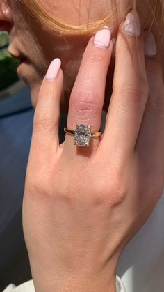 a close up of a person wearing a ring