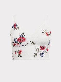 Soft and stretchy floral printed lace wraps a dreamy bralette that has flirty scalloped trim and is begging to peek out from tees and tanks. Matching style(s): Search 11665236. Wireless non-padded cups. Adjustable straps. Racerback. Scalloped lace trim. Semi-sheer . CONTENT + CARE: Nylon/spandex. Wash cold; dry flat. Imported plus size bra. SIZE + FIT: Model is wearing size 2 with Torrid Strapless Bra. The best plus size women's unlined lace crop bralette bras in patriot floral made of lace. V-neck Lace Crop Top With Lace Trim, Lace Tops With Spaghetti Straps And Floral Print, Lace Spaghetti Strap Top With Floral Print, Floral Print Lace Camisole Top, Summer Tops With Lace Closure, Lace V-neck Crop Top With Lace Trim, Lace Cami Crop Top With Lace Trim, Feminine Lace Crop Top With Spaghetti Straps, Spring Delicate Lace Cami Crop Top