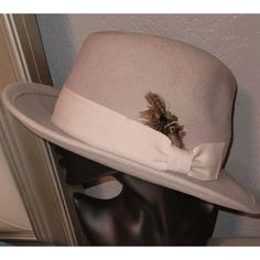 Elevate Your Style With This Designer Johnny Was Fedora Hat. Made Of 100% Wool With A Beige Color And Feather Accents, This Hat Is Perfect For Any Occasion, From Weddings To Casual Outings. The Hat Has A Solid Pattern And A Classic Style That Is Suitable For Any Fashionable Woman. This Lightweight Hat Has A Felt Fabric Type And Is Perfect For The Winter, Fall, And Spring Seasons. The Hat Is One Size Fits All, Making It Suitable For Any Head Size. Please See Pictures And Ask Any Questions Wool Fedora Hat, Wool Fedora, Felt Fabric, Fedora Hat, Johnny Was, Solid Pattern, Beige Color, The Winter, One Size Fits All