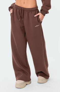 EDIKTED Brenna Low Rise Wide Leg Sweatpants | Nordstrom Sporty Brown Pants, Wide Sweatpants, Sweatpants Style, Wide Leg Sweatpants, Belly Chain, Black Friday Sale, Cropped Hoodie, S Models, Model Height