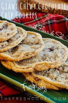 giant chewy chocolate chip cookies on a green platter with red and black plaid