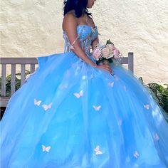 Beautiful Quinceanera, Baby Blue Dress With Rose, Gold, Peach Tone, Butterflies, Hint Of Silver All Over The Dress Amazing Gown One-Of-A-Kind It's Considered A One Size Because It's A Corset Top Pictures Do You Know Justice Worn For Pictures And Birthday Party Small Tear On One Of The Sheer Lace Can Be Fixed Can Send More Pictures Still In Amazing Condition Paid Over 5600 But I Am Willing To Work Out Reasonable Pricing Can Also Add Crowns And Bouquet. Also Shoes If Needed Let Me Know If You Would Like More Close-Up Pictures. The Bow In The Back Is Removable. Open To Reasonable Prices. Pale Blue Quinceanera Dress, Blue Tulle Quinceanera Dress, Blue Quinceanera Dress For Sweet 16, Blue Princess Quinceanera Dress For Prom Season, Princess Style Blue Quinceanera Ball Gown, Blue Tulle Dress For Sweet 16, Blue Princess Quinceanera Dress For Debutante Ball, Fitted Blue Quinceanera Dress For Sweet 16, Blue Ball Gown For Sweet 16