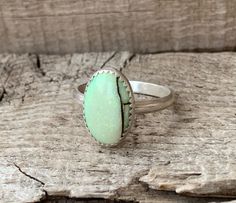 Untreated Oval Opal Ring In Silver, Silver Oval Opal Ring Untreated, Artisan Oval Opal Ring Gift, Oval Chrysoprase Opal Ring For Gift, Adjustable Oval Opal Ring With Large Stone, Artisan Oval Opal Ring In Sterling Silver, Artisan Sterling Silver Opal Ring, Handmade Oval Opal Ring In Sterling Silver, Artisan Sterling Silver Oval Opal Ring