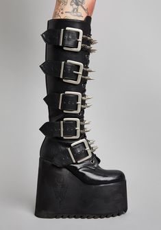 cuz you're burning it all down to the ground babe! Go off in these wicked platform boots that have spiked adjustable buckles all over, embossed logos on the soles, N' side zip closures. Gothic Boots With Studded Outsoles For Concerts, Studded Gothic Moto Boots For Alternative Fashion, Gothic Studded Moto Boots For Alternative Fashion, Edgy Moto Boots With Spikes For Concerts, Alternative Style Boots With Grommets, Edgy Platform Boots With Rivets For Concerts, Alternative Leather Platform Boots With Studs, Studded Leather Platform Boots In Alternative Style, Spiked Leather Platform Boots For Concerts