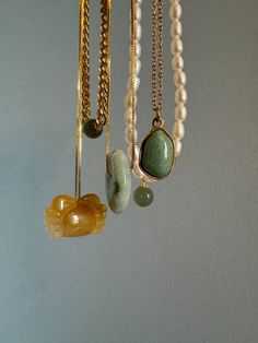 This dainty gemstone necklace with a pop of light green color features a skinny adjustable chain plated with gold and an aventurine pendant. It will be your new everyday necklace no matter the outfit.

Natural aventurine. Made by handwork of carving and polishing. Because of the gemstone’s natural characteristics, each piece may vary slightly in colors and textures. Gold Jade Gemstone Crystal Necklace, Gold Jade Crystal Necklace With Gemstone, Gold Jade Necklace With Gemstone Beads, Dainty Gold Jade Necklace, Gold Jade Crystal Necklaces As Gifts, Handmade Gold Amazonite Necklaces, Gold Jade Crystal Necklace Gift, Gold Jade Crystal Necklace As Gift, Handmade Gold Amazonite Necklace