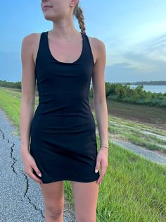 -tennis dress -scoop neckline -racerback -built in shorts Model is wearing a size medium With Love <3 Active Dress, Short Models, Tennis Dress, Scoop Neckline, Black Color, Tennis, Black Dress, Size Medium, How To Wear