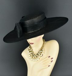 Note: The design of this hat, particularly the shallower crown, was crafted to create a unique aesthetic that suits some individuals perfectly. However, if you notice that the hat tends to slip, I would advise attaching an elastic strap to ensure a more secure and comfortable fit. ✿*.Key Features.*✿ This is a wide flat brim hat!! It's made of sinamay (3 layers ) and satin.  A nice sinamay bow is trimmed with satin ribbon too, very cool, one of my favorite hats! High quality. It's more beautiful in person! Great for Kentucky derby, weddings, church, Easter, Royal Ascot, horse races, cocktails, tea party, or any hat wearing occasion. Hat base size: From front to back: 19" (48cm) From left to right: 18.25" (46cm) Wide brim appr: 6" (15cm) Crown Depth: 3.5" (9cm) Hat girth: 21" (53.34cm). It f Formal Hat With Structured Crown For Royal Ascot, Royal Ascot Formal Hat With Structured Crown, Royal Ascot Structured Crown Formal Hat, Fitted Wide Brim Sinamay Top Hat, Elegant Mini Hat With Flat Brim For Formal Events, Elegant Mini Hat With Flat Brim For Formal Occasions, Elegant Flat Brim Formal Hat, Elegant Fitted Top Hat With Flat Brim, Fitted Sinamay Boater Hat With Flat Brim