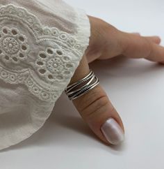 🧡 Indulge in the allure of our Multi Layer Chunky Silver Thumb Ring, a dainty yet captivating piece designed exclusively for women. Its intricate layers and chunky silver construction create a striking visual effect that is both fashionable and versatile. The open adjustable design ensures a comfortable fit on any finger, making it the perfect accessory for everyday wear.  🧡 Crafted with exquisite attention to detail, this weaved layered ring embodies modern elegance and timeless style. Looking for a meaningful gift? This thumb ring makes an exceptional choice for mothers, symbolizing the unbreakable bond between a mother and child. Treat yourself or someone special to this exquisite silver ring and let its beauty speak volumes. Discover the perfect balance between sophistication and sen Adjustable Wide Band Open Ring, Silver Engraved Stackable Ring, Bohemian Rings For Anniversary, Silver Thumb Rings For Women, Thumb Rings For Women, Sterling Silver Thumb Rings, Chunky Silver Rings, Thumb Rings Silver, Layered Rings