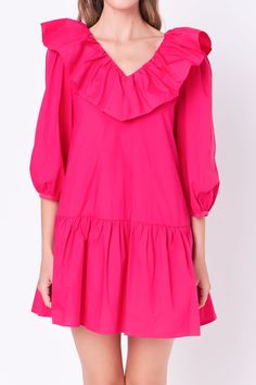 This sweet and chic ruffled mini is perfect for dressing up or dressing down. With a flattering v-neckline and delicate ruffle detail, this mini is perfect for showing off your curves. Made with a soft and lightweight fabric, it's perfect for layering. Dress it up with heels or dress it down with sandals - either way, you're sure to fall in love with our ruffled mini. V neckline Ruffle detail 3/4 puff sleeve Mini length Lining Hand wash cold Do not bleach Do not tumble dry Iron low Shell: 100% Cotton Lining: 80% Polyester 20% Cotton HN1196D Total length :33.75" Bust :36.5" S Height 5'9"/(175cm) / Bust 30"/(76.5cm) / Waist 24.5"(62cm) / Hip 34"(86cm) Pink V-neck Mini Dress With Ruffle Hem, Feminine Spring V-neck Dress With Ruffles, Spring Tiered V-neck Dress With Ruffles, Chic Pink V-neck Ruffle Dress, Spring V-neck Dress With Ruffle Sleeves, Spring V-neck Dress With Ruffles For Date Night, Chic V-neck Dress With Ruffle Hem For Day Out, Spring Mini V-neck Dress With Ruffle Hem, Chic V-neck Ruffle Dress