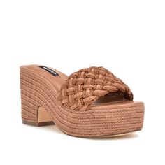 Nine West-Roxana Espadrille Platform Sandal Your warm weather look gets a glamorous touch with the Roxana espadrille sandal from Nine West. Striking woven details on the upper add elegance to this slip-on sandal that is set atop a stylish espadrille platform and heel. Casual Straw Mules With Round Toe, Brown Heels With Removable Insole For Summer, Casual Summer Platform Mules, Casual Natural Heels For Vacation, Spring Straw Wedge Sandals With Textured Footbed, Spring Sandals With Textured Footbed In Natural Color, Spring Sandals With Textured Footbed, Trendy Block Heel Mules For Beach, Beach Platform Heels Made Of Espadrille