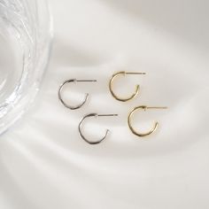 Beautiful dainty diamond hoop earrings that can be worn alone for a pop of bling, or paired with huggies! They're the perfect size and lightweight, great for any occasion :) Made of 925 Sterling Silver THICK plating of 14k Gold or Rhodium Inner diameter: 12mm; Outer diameter: 16mm 2mm thick Sold as a PAIR Made of highest quality cubic zirconia VERY HIGH QUALITY Nickel-free & Hypoallergenic - great for sensitive ears! Super light-weight Earrings on Model: Pavé Huggies 🎁 Comes in a gift-box, read Sterling Silver Stackable Huggie Earrings For Everyday, Everyday Stackable Sterling Silver Huggie Earrings, Trendy Small Hoop Sterling Silver Huggie Earrings, Trendy Small Hoop Huggie Earrings In Sterling Silver, Trendy Sterling Silver Small Hoop Huggie Earrings, Everyday Sterling Silver Stackable Hoop Earrings, Minimalist Sterling Silver Stackable Huggie Earrings, Minimalist Small Hoop Stackable Earrings, Sterling Silver Huggie Stackable Earrings